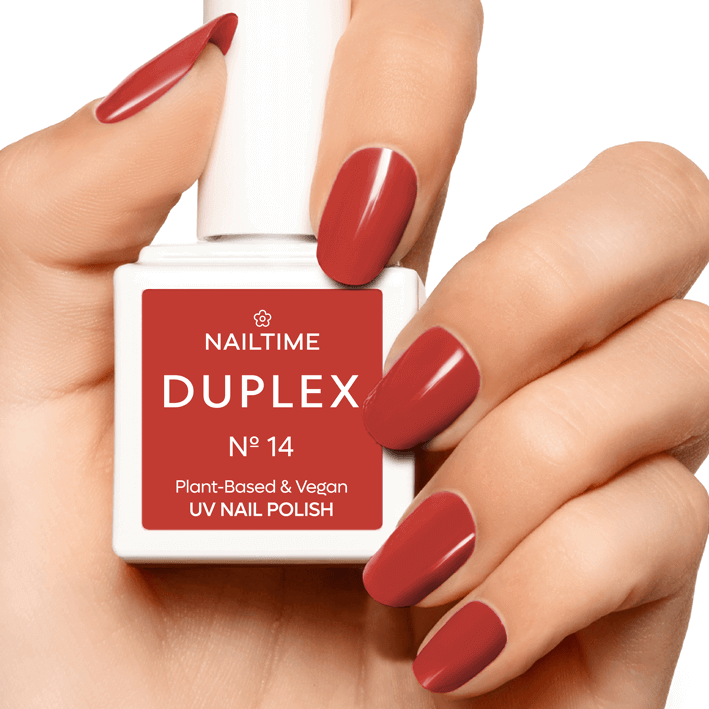 DUPLEX No.14 Melody UV nail polish in peach coral, plant-based, vegan, dries in 60 seconds, lasts 3x longer.