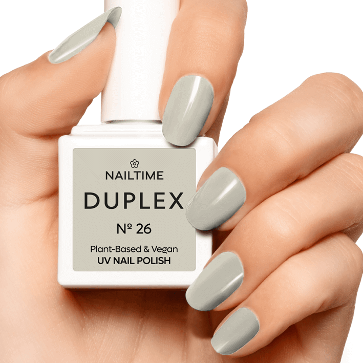 DUPLEX NAIL POLISH No.26 in Marshmallow shade on manicured nails, vegan and plant-based formula.