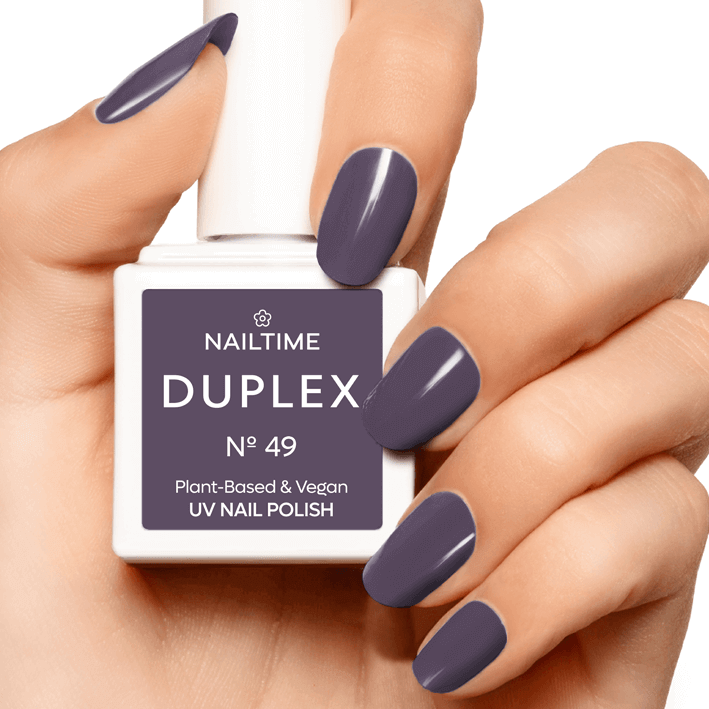 DUPLEX NAIL POLISH No.49 in dark plum violet, plant-based vegan UV formula, drying in 60 seconds, long-lasting nail color.