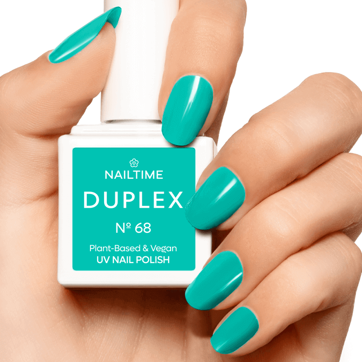 DUPLEX N°68 jade green plant-based UV nail polish in a hand, vegan and quick-drying formula.