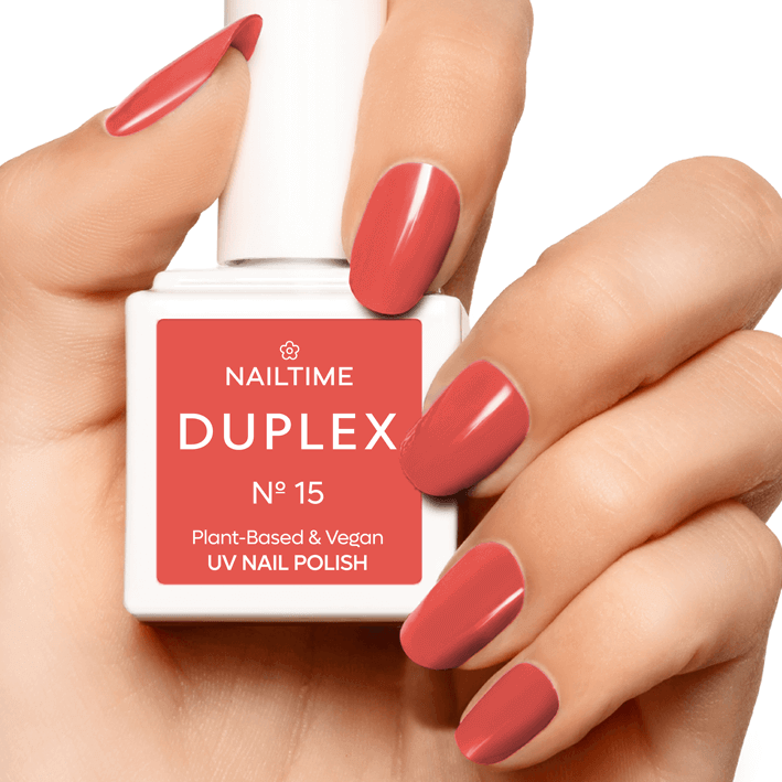 DUPLEX Nail Polish No.15 in bright orange-red, plant-based, vegan UV formula, drying in 60 seconds.