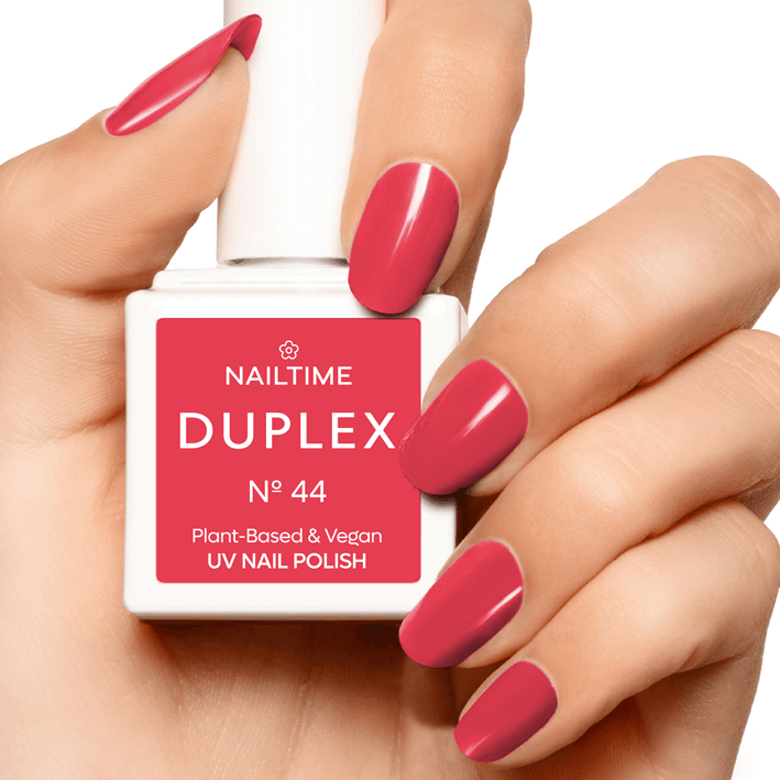 DUPLEX N°44 UV Nail Polish in bright coral red, plant-based and vegan formula, drying in 90 seconds, perfect for long-lasting wear.