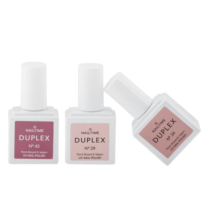 DUPLEX nude UV nail polish collection featuring plant-based, vegan formulas in soft pink shades.