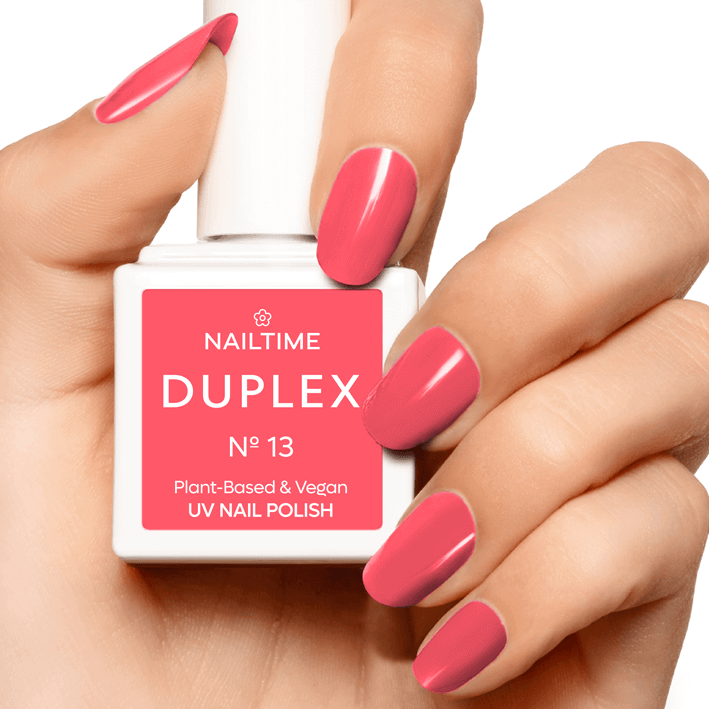 DUPLEX No.13 Sexy Plunge UV Nail Polish in coral color, plant-based and vegan formula, drying in 60 seconds.