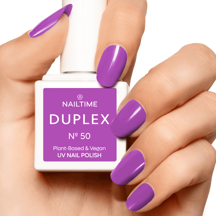 DUPLEX Nail Polish No.50 in vibrant violet, vegan and plant-based, drying under UV light in 90 seconds.
